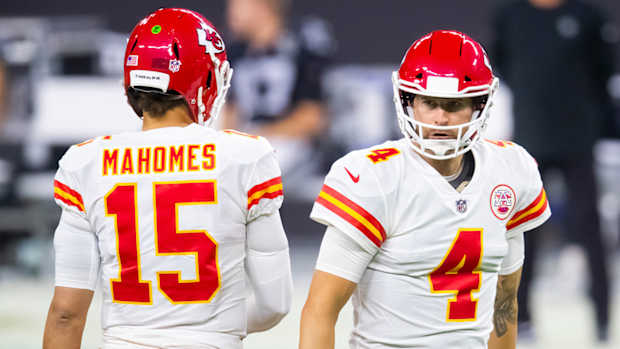 Kansas City Chiefs quarterback Patrick Mahomes (15) and Chad Henne (4) against the Las Vegas Raiders at Allegiant Stadium
